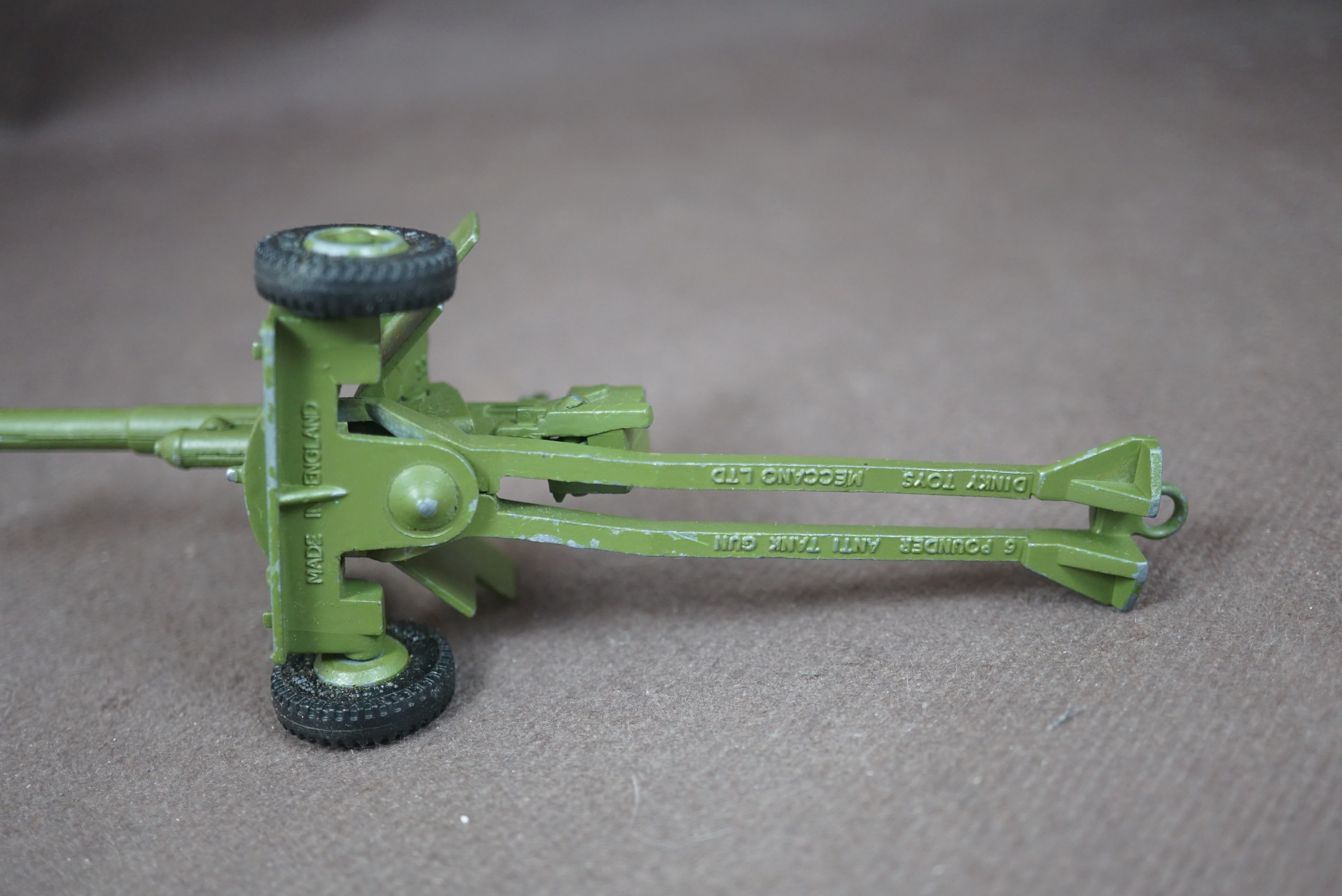 A Dinky Toys No. 617 Volkswagen KDF and 50mm P.A.K. anti-tank gun, with bubble pack and stand